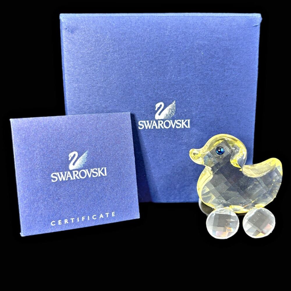 Retired Swarovski Yellow Crystal Lucy Duck Figurine Rolling Wheels 2006 BOX